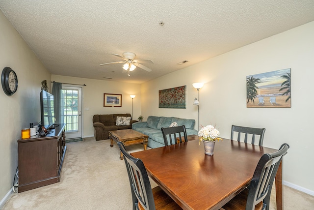 2601 Riverridge Ct Unit A, Moncks Corner, SC 29461 - dining area with a ceiling fan, light colored carpet, and a textured ceiling