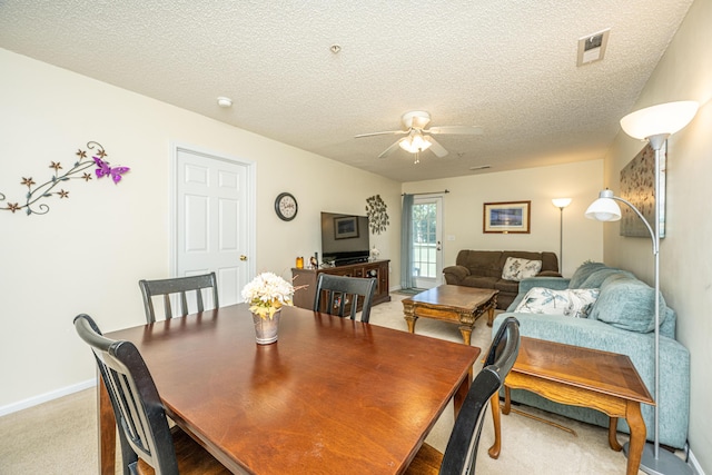 2601 Riverridge Ct Unit A, Moncks Corner, SC 29461 - dining space with light colored carpet, a ceiling fan, and a textured ceiling