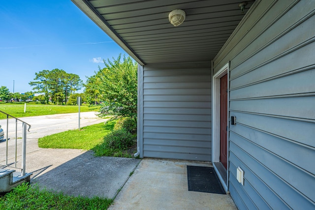 2601 Riverridge Ct Unit A, Moncks Corner, SC 29461 - property entrance with a yard and a carport