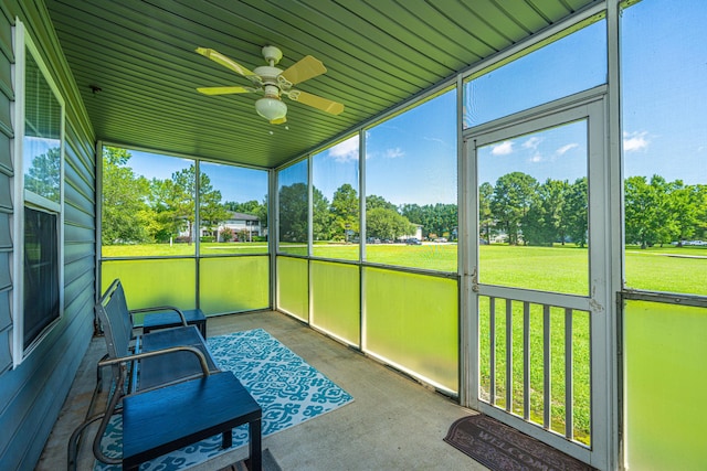 2601 Riverridge Ct Unit A, Moncks Corner, SC 29461 - sunroom / solarium featuring a ceiling fan and view of scattered trees