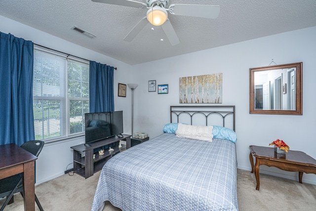 2601 Riverridge Ct Unit A, Moncks Corner, SC 29461 - bedroom featuring light carpet, multiple windows, ceiling fan, and a textured ceiling