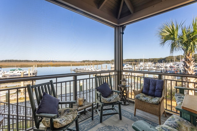 balcony featuring a water view