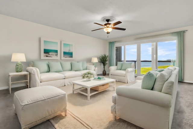100 Mariners Cay Dr, Folly Beach, SC 29439 - carpeted living area featuring ceiling fan, baseboards, and a water view