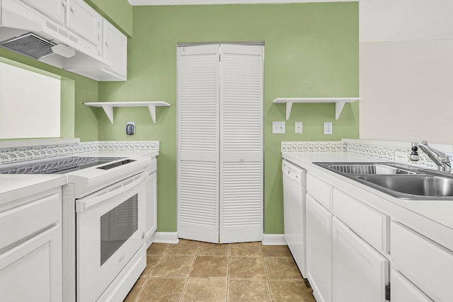 kitchen with white cabinets, white appliances, light tile patterned floors, and sink