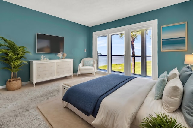 100 Mariners Cay Dr, Folly Beach, SC 29439 - carpeted bedroom featuring baseboards