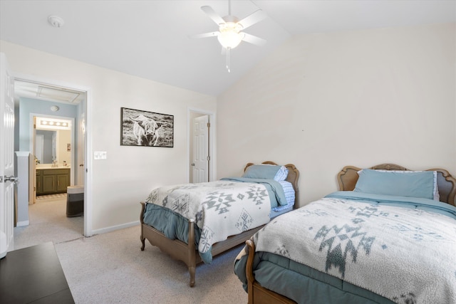 bedroom with a ceiling fan, baseboards, lofted ceiling, attic access, and light colored carpet