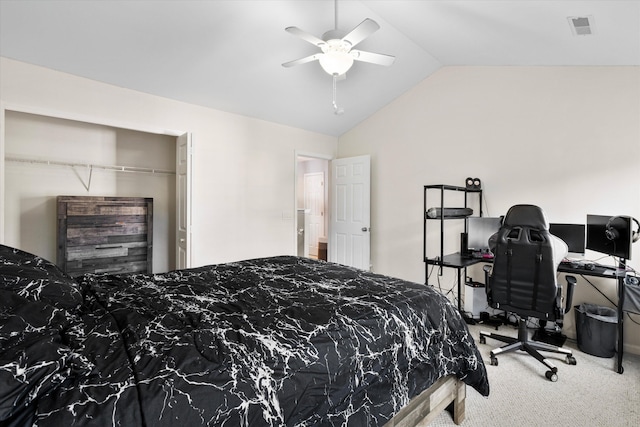 carpeted bedroom featuring visible vents, a ceiling fan, and vaulted ceiling