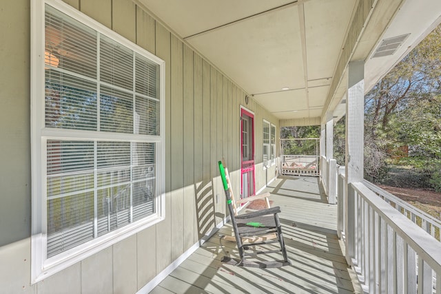 deck with covered porch