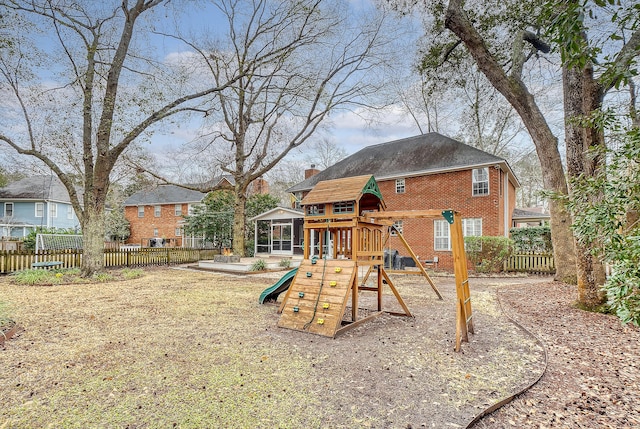 view of playground with fence