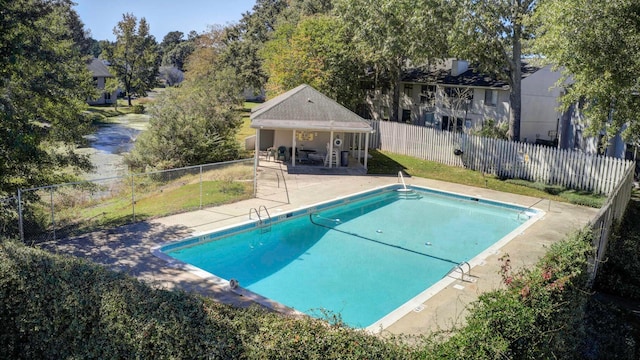 607 Waterwood Dr, Goose Creek, SC 29445 - community pool with a patio area and fence