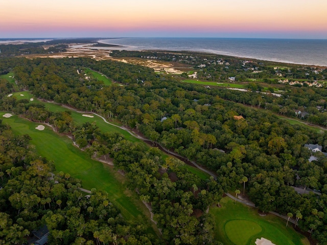 aerial view at dusk with a water view