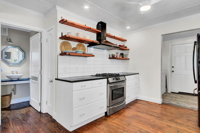 kitchen with ornamental molding, tasteful backsplash, island range hood, dark wood-type flooring, and gas range