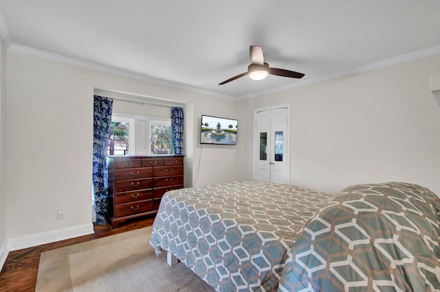 bedroom featuring crown molding, ceiling fan, a closet, and wood-type flooring