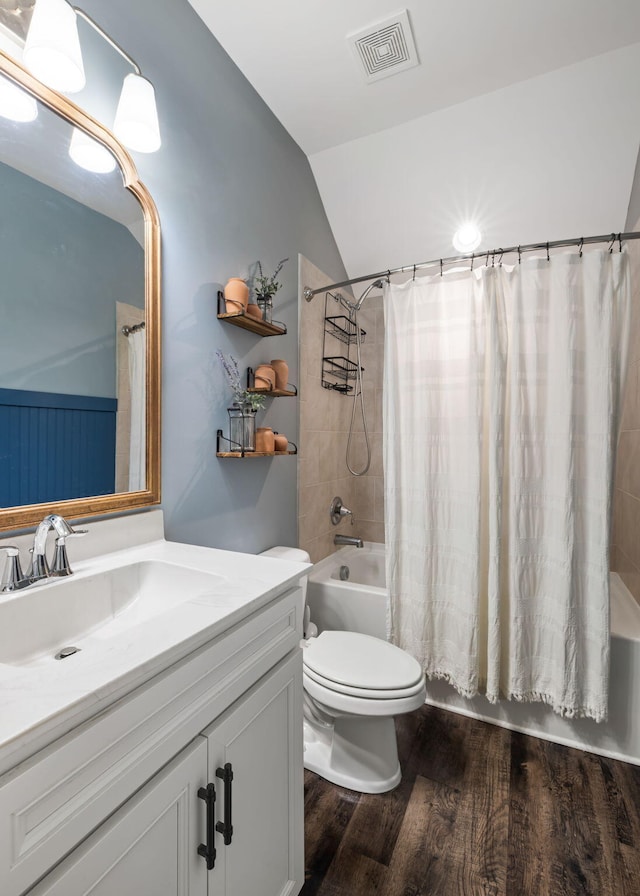 423 Sanctuary Park Dr, Summerville, SC 29486 - full bathroom with wood finished floors, vanity, shower / tub combo with curtain, and lofted ceiling