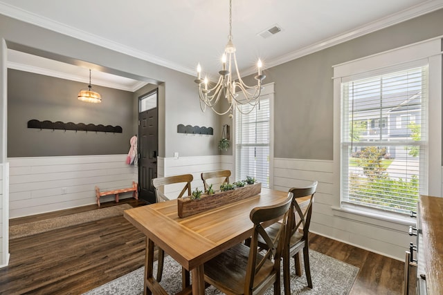 423 Sanctuary Park Dr, Summerville, SC 29486 - dining space with a chandelier, wainscoting, dark wood finished floors, and ornamental molding