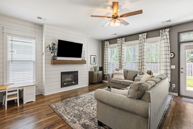 423 Sanctuary Park Dr, Summerville, SC 29486 - living room featuring dark wood-type flooring, a fireplace, a ceiling fan, and a desk