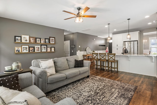 423 Sanctuary Park Dr, Summerville, SC 29486 - living area with dark wood-style flooring, a ceiling fan, and recessed lighting
