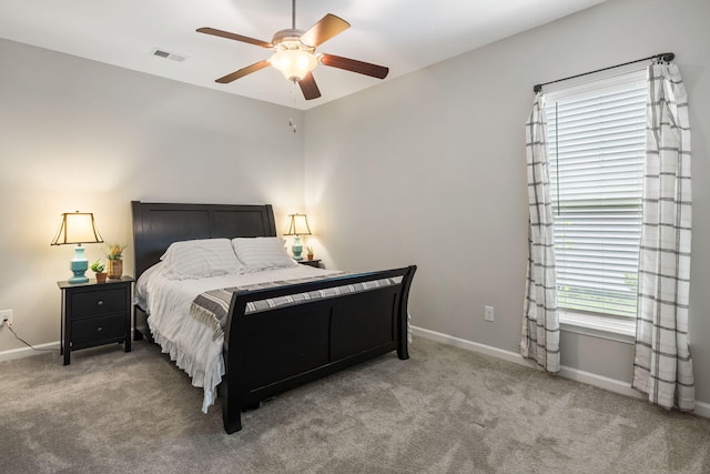 423 Sanctuary Park Dr, Summerville, SC 29486 - carpeted bedroom featuring baseboards and a ceiling fan