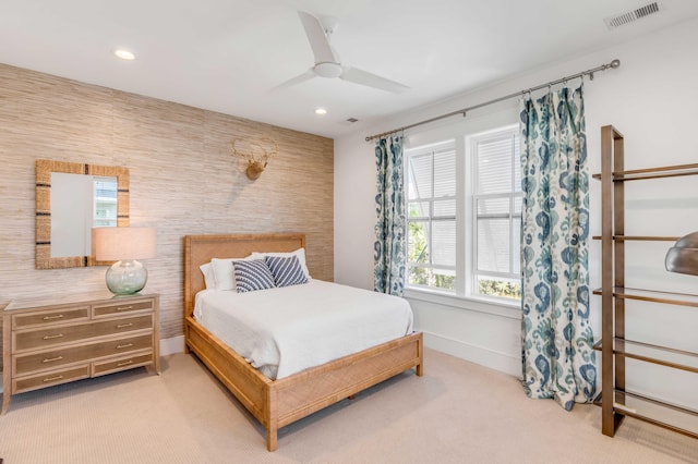 carpeted bedroom featuring ceiling fan