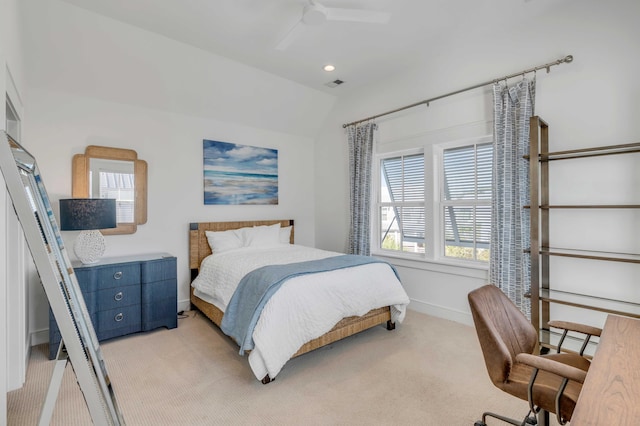 carpeted bedroom featuring lofted ceiling and ceiling fan