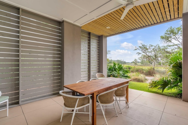 view of patio featuring ceiling fan