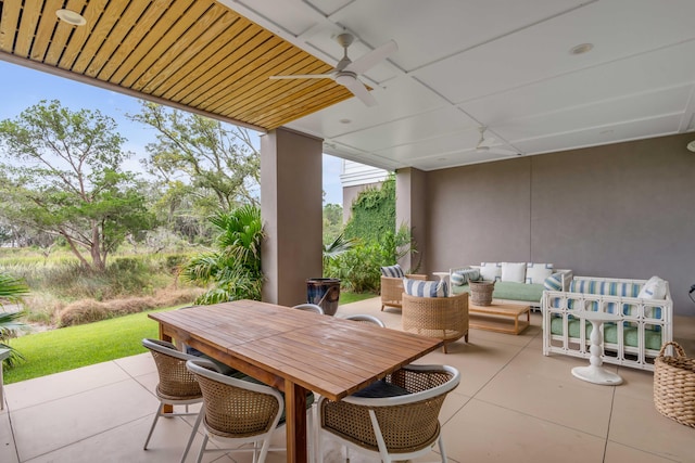 view of patio with ceiling fan and an outdoor hangout area