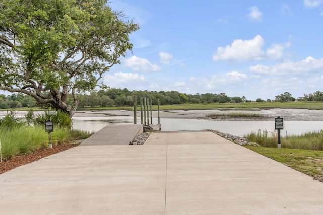 view of patio featuring a water view