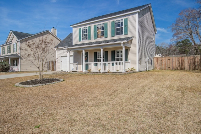 view of front of property with covered porch, fence, a front lawn, and concrete driveway