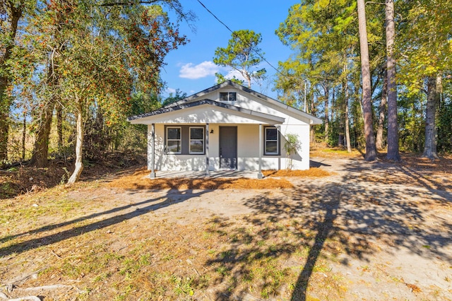 bungalow-style home featuring a porch