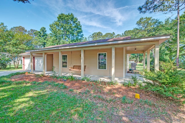 441 Compton Dr, Moncks Corner, SC 29461 - country-style home with a porch, a garage, and driveway
