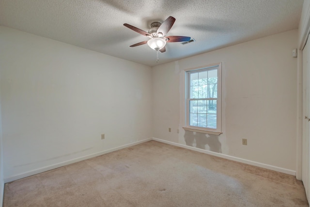 441 Compton Dr, Moncks Corner, SC 29461 - spare room featuring light colored carpet, ceiling fan, baseboards, and a textured ceiling