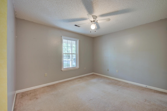 441 Compton Dr, Moncks Corner, SC 29461 - spare room with carpet flooring, a ceiling fan, baseboards, and a textured ceiling