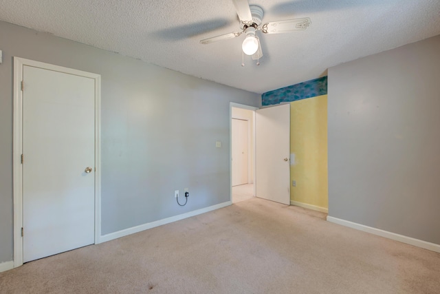 441 Compton Dr, Moncks Corner, SC 29461 - unfurnished bedroom with carpet floors, baseboards, ceiling fan, and a textured ceiling