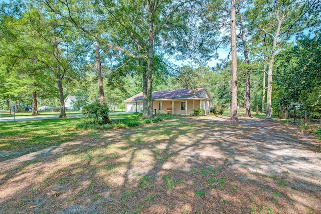 441 Compton Dr, Moncks Corner, SC 29461 - view of front of house with covered porch and view of wooded area