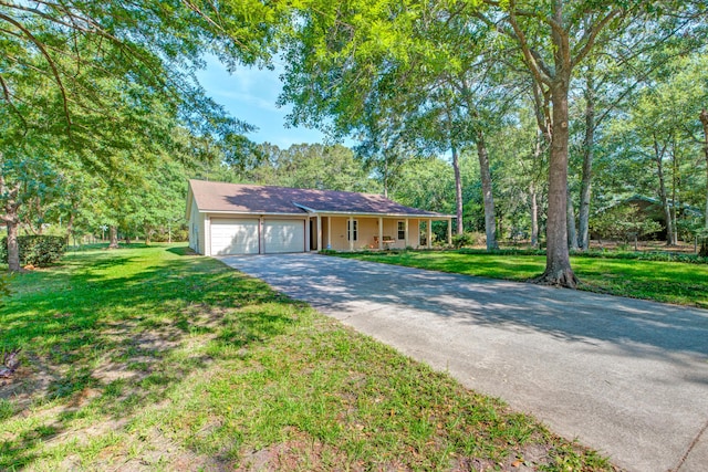 441 Compton Dr, Moncks Corner, SC 29461 - ranch-style house with asphalt driveway, a garage, and a front lawn