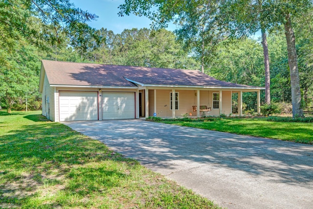 441 Compton Dr, Moncks Corner, SC 29461 - view of front facade featuring a garage, covered porch, a front lawn, and driveway