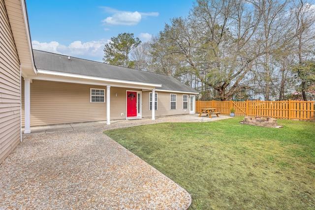 view of yard featuring a patio and fence