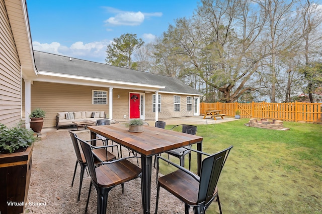 view of patio with an outdoor hangout area and fence