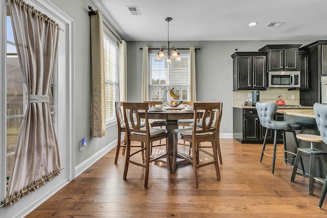 219 Daybreak Blvd, Summerville, SC 29486 - dining space with visible vents, baseboards, an inviting chandelier, and light wood finished floors