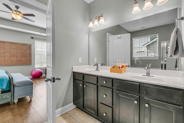 219 Daybreak Blvd, Summerville, SC 29486 - bathroom featuring ensuite bath, double vanity, baseboards, and a sink