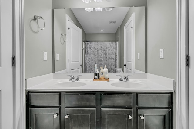 219 Daybreak Blvd, Summerville, SC 29486 - bathroom featuring double vanity, visible vents, toilet, and a sink