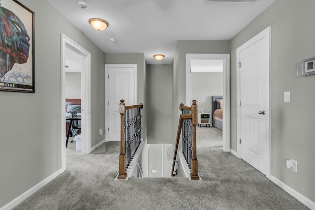 219 Daybreak Blvd, Summerville, SC 29486 - hall featuring visible vents, carpet flooring, an upstairs landing, and baseboards