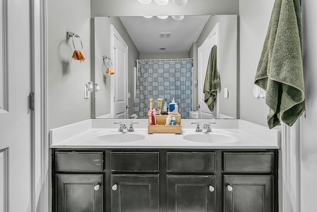 219 Daybreak Blvd, Summerville, SC 29486 - bathroom with double vanity, visible vents, a shower with shower curtain, and a sink