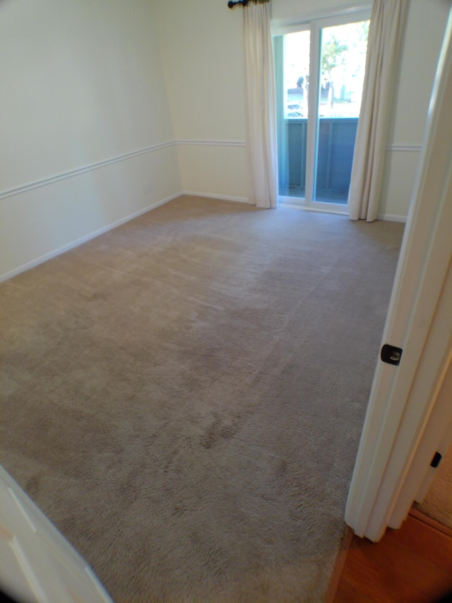 view of carpeted spare room