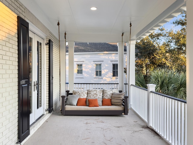 balcony featuring covered porch