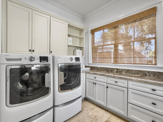 laundry room with crown molding, plenty of natural light, cabinets, and independent washer and dryer