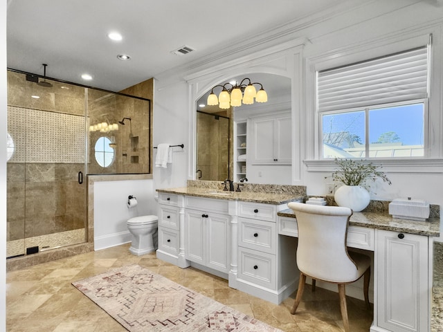 bathroom featuring crown molding, a shower with door, vanity, and toilet