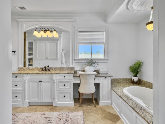 bathroom with a washtub, ornamental molding, and vanity