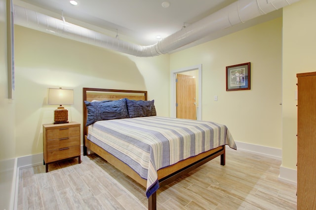 bedroom featuring light hardwood / wood-style floors