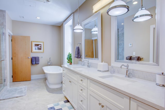 bathroom with separate shower and tub and vanity